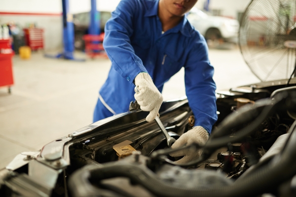 Mechanic working on engine